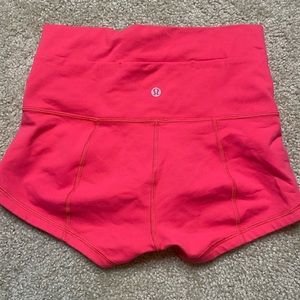 Hot pink lululemon workout shorts